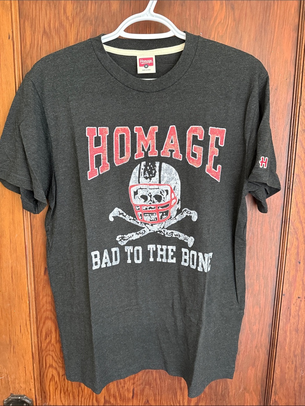 HOMAGE Charcoal Tee with Red & White Football Skull Graphic - Size M